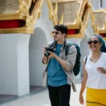 traveler immersing in local culture beyond typical tourist experiences